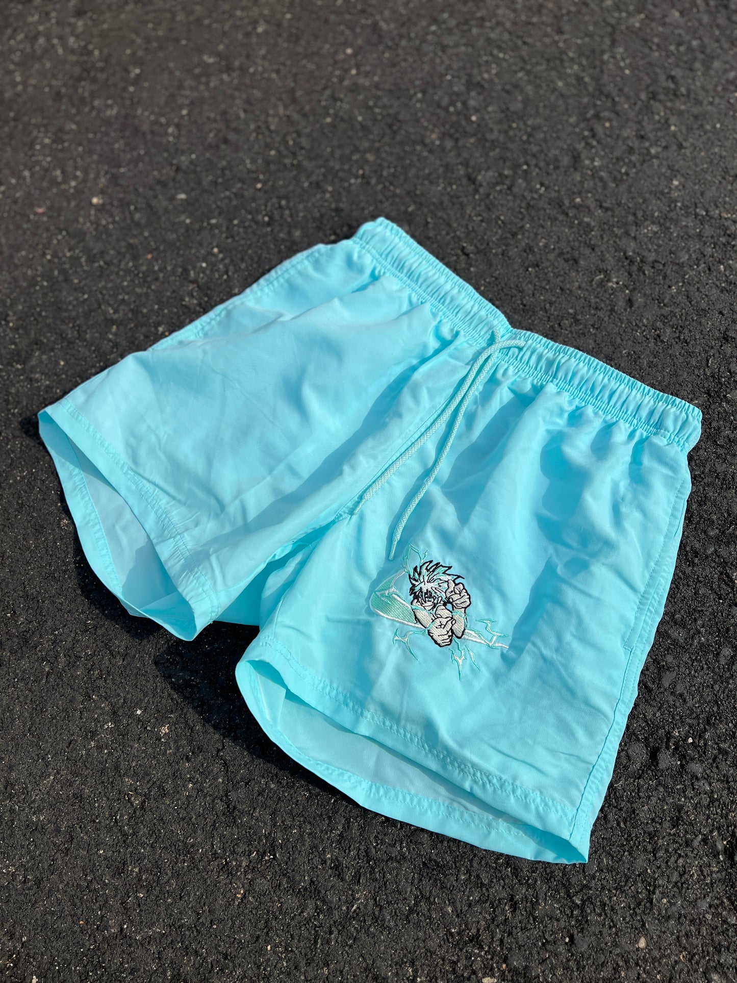 Pack Verano Anime: Bañador ECO Personalizable + Toalla Bordada